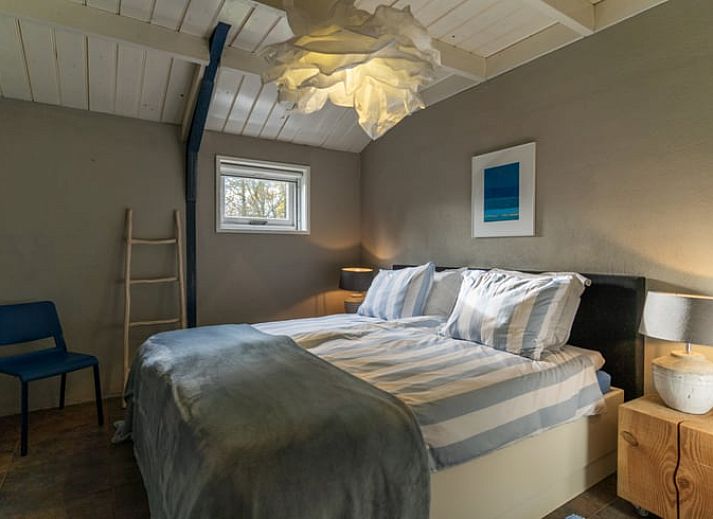 Gemuetliches Wohnzimmer mit Holzofen im Ferienhaus Wenum Wiesel, Veluwe.