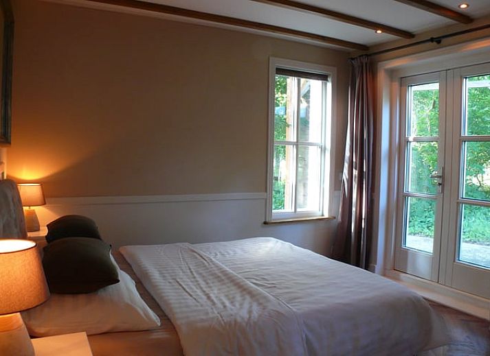 Moderne Kueche des Ferienhauses in 't Loo Oldebroek in Veluwe, Gelderland.