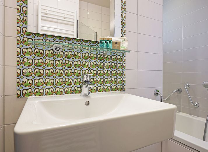 Spacious living room with open kitchen in Rabbit Hill 6-bed bungalow, Veluwe.