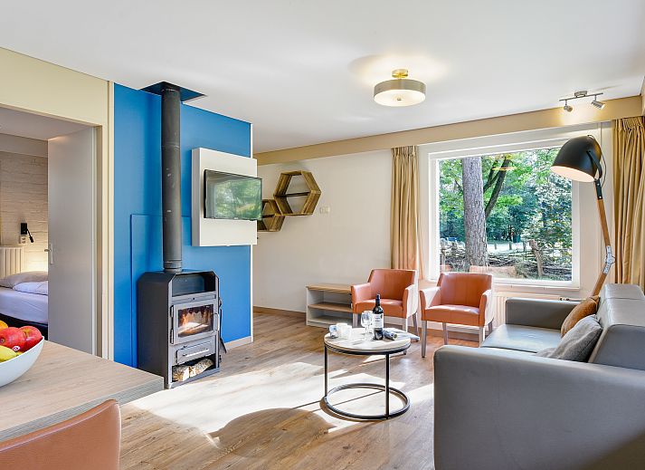 Terras van Rabbit Hill 4-persoons bungalow in Nieuw Milligen, Veluwe.