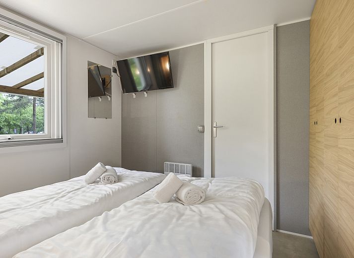 Gezellige binnenruimte van Rabbit Hill 6-persoons mobile home, Veluwe, Gelderland.