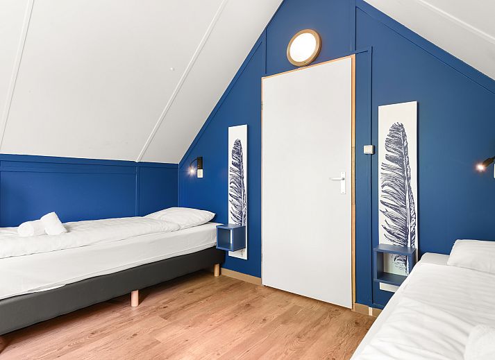 Moderne offene Kueche und Wohnzimmer des 8-Bett-Bungalows Rabbit Hill in Nieuw Milligen, Gelderland.