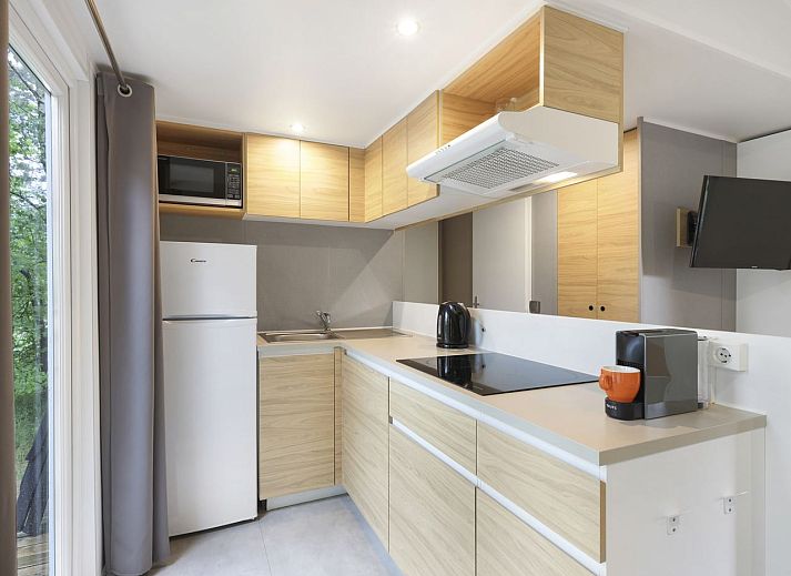 Modern kitchen and living room in Rabbit Hill 6-person mobile home, Nieuw Milligen, Veluwe, Gelderland