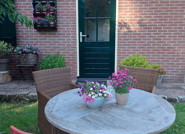 Ruime eetkamer in Huisje in Klarenbeek, Veluwe, ideaal voor familiediners in een vakantiehuis.