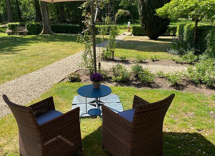 Ruime eetkamer in Huisje in Klarenbeek, Veluwe, ideaal voor familiediners in een vakantiehuis.