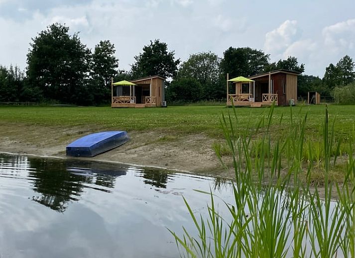 Charmant vakantiehuisje in Beemte Broekland met veranda, gelegen op de Veluwe in Gelderland.
