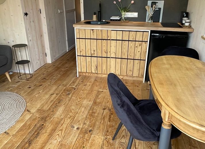 Charmant vakantiehuisje in Beemte Broekland met veranda, gelegen op de Veluwe in Gelderland.