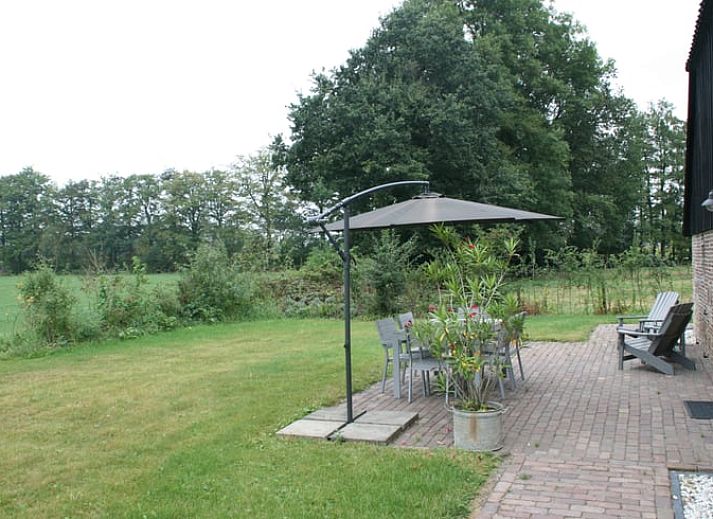 Ferienhaus in Hierden, Veluwe-Ferienhaus mit charmanter Backsteinfassade und Terrasse in Gelderland.