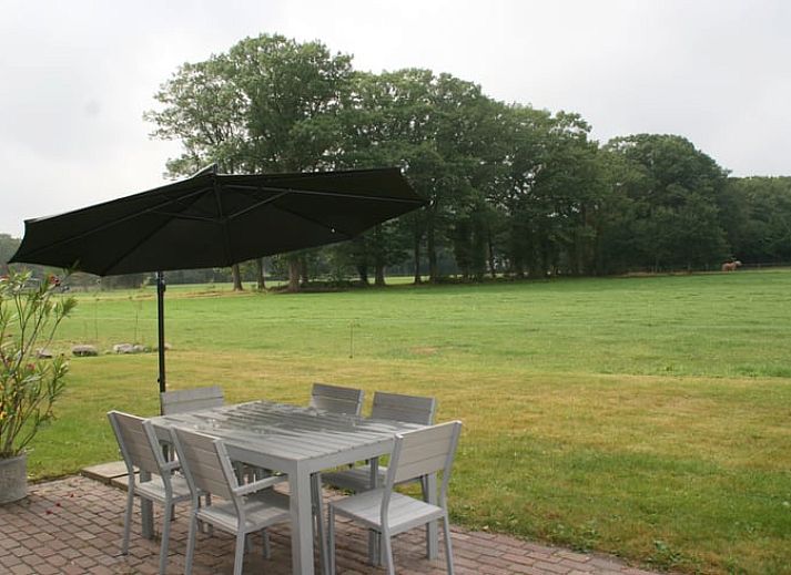 Ferienhaus in Hierden, Veluwe-Ferienhaus mit charmanter Backsteinfassade und Terrasse in Gelderland.