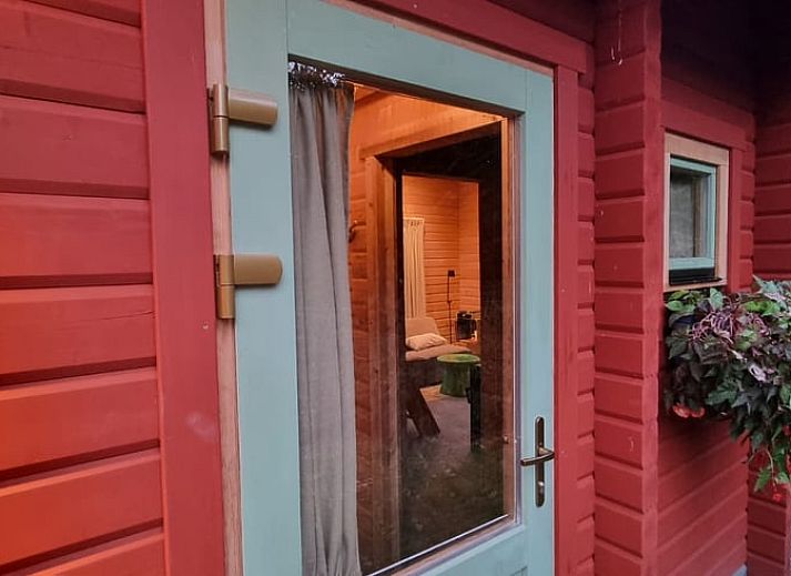 Knusse zitruimte in het vakantiehuis Huisje in Barneveld, Veluwe, Gelderland.