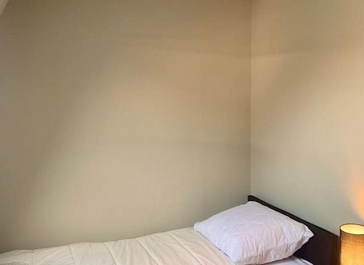 Charmante buitenkant van Vakantiehuis in Barneveld, Veluwe, Gelderland met groene tuin.