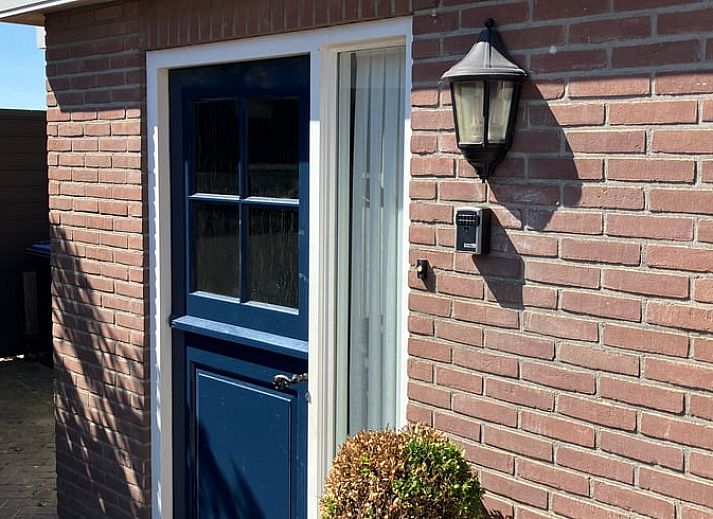 Sfeervolle slaapkamer in Vakantiehuis in Barneveld, Veluwe, Gelderland met luxe verlichting.