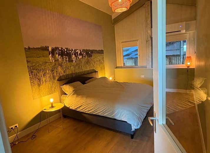 View from the kitchen of Holiday Home in Schildwolde, Groningen, with wide fields and a river in northeastern Groningen.