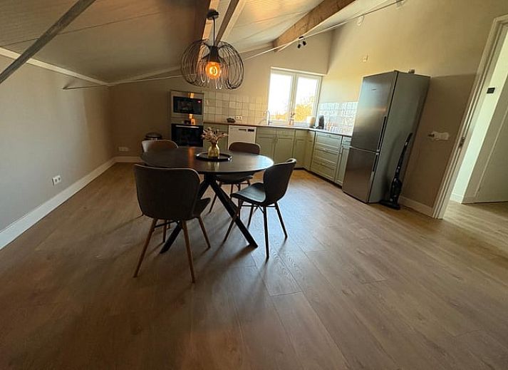 View from the kitchen of Holiday Home in Schildwolde, Groningen, with wide fields and a river in northeastern Groningen.