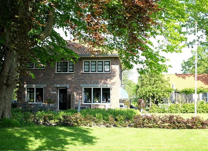 Gemuetliche Sitzecke im Ferienhaus mit Sauna in Vierhuizen, Groningen.
