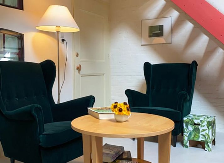 Gezellige slaapkamer in Vakantiehuisje in Molenrij, Noordwest Groningen, met warme verlichting.