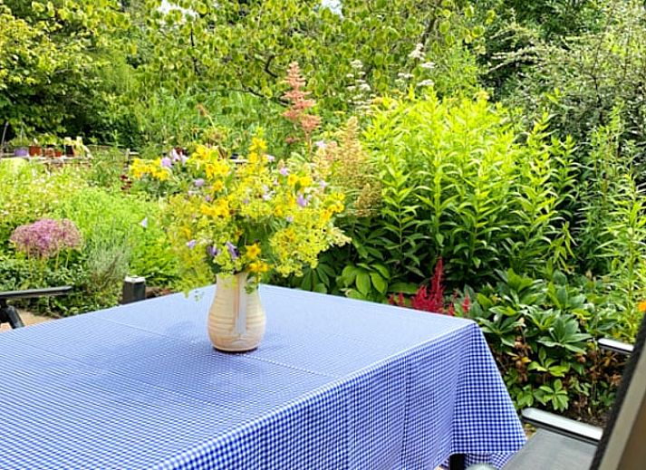 Gezellige slaapkamer in Vakantiehuisje in Molenrij, Noordwest Groningen, met warme verlichting.