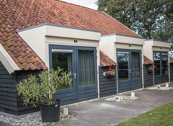 Gemuetliche Leseecke im Ferienhaus in Bourtange, perfekt fuer Entspannung in Groningen.