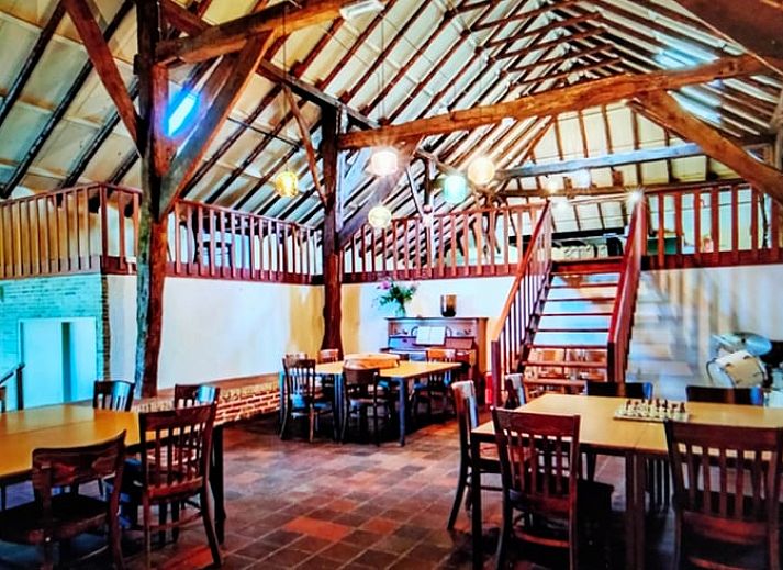 Gemuetliche Leseecke im Ferienhaus in Bourtange, perfekt fuer Entspannung in Groningen.