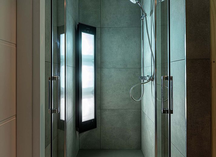 Gezellige woonkamer in de Vrijstaande woning in Sellingen, vakantiehuis in Zuidoost Groningen.