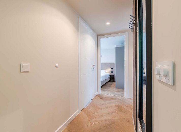 Vrijstaande woning in Sellingen met houten gevels, perfect voor vakantie in Groningen.