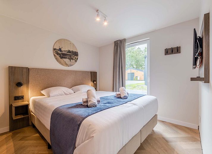 Vrijstaande woning in Sellingen met houten gevels, perfect voor vakantie in Groningen.