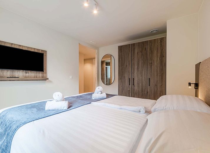 Vrijstaande woning in Sellingen met houten gevels, perfect voor vakantie in Groningen.