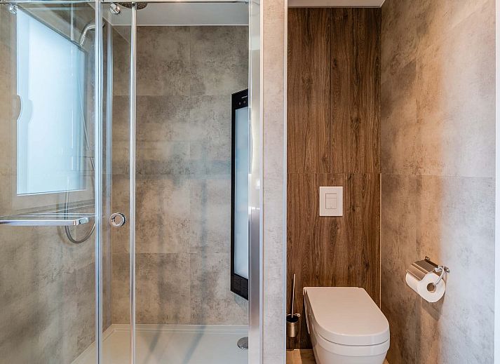 Binnenruimte van vakantiehuis in Sellingen, Zuidoost Groningen met comfortabele zithoek.