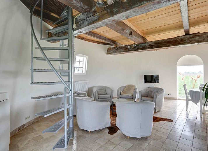 Uitzicht op de landelijke omgeving van GR029 vakantiehuis in Tripscompagnie, Groningen met groene velden.