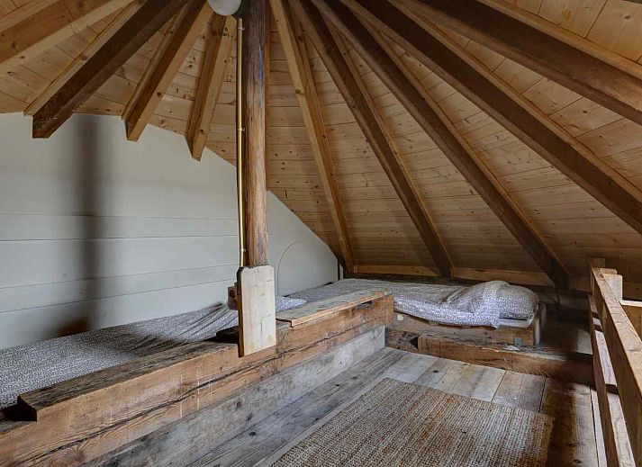 Uitzicht op de landelijke omgeving van GR029 vakantiehuis in Tripscompagnie, Groningen met groene velden.