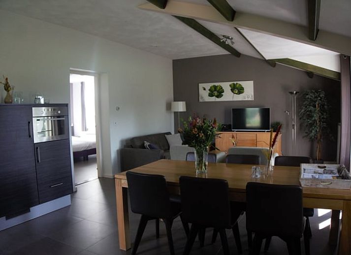 Flowering orchard at Holiday home in Roggel, ideal for a relaxing stay in Limburg.