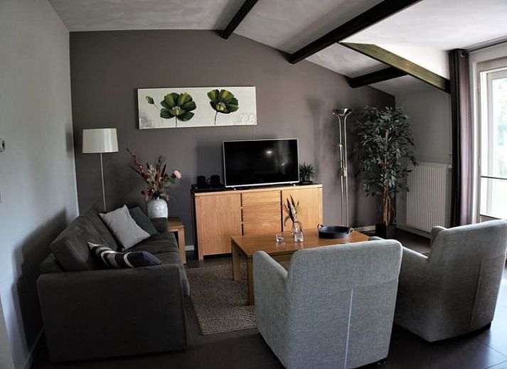 Flowering orchard at Holiday home in Roggel, ideal for a relaxing stay in Limburg.