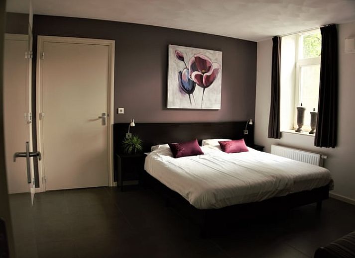 Flowering orchard at Holiday home in Roggel, ideal for a relaxing stay in Limburg.