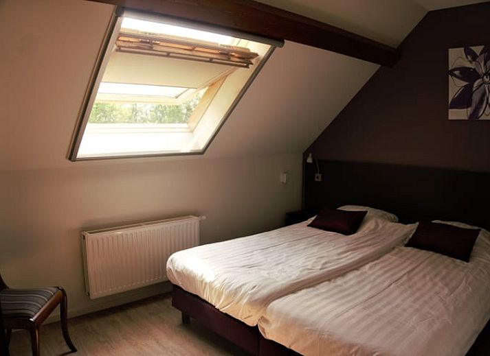 Flowering orchard at Holiday home in Roggel, ideal for a relaxing stay in Limburg.