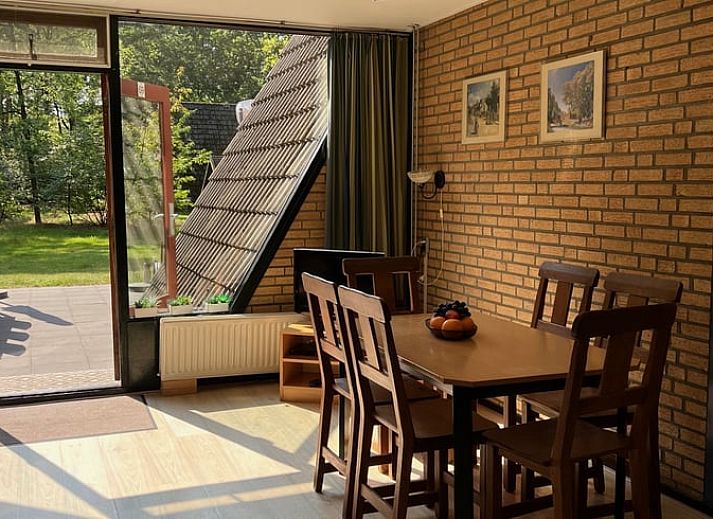 Rustic surroundings around Holiday home in Stramproy, Limburg with green trees.