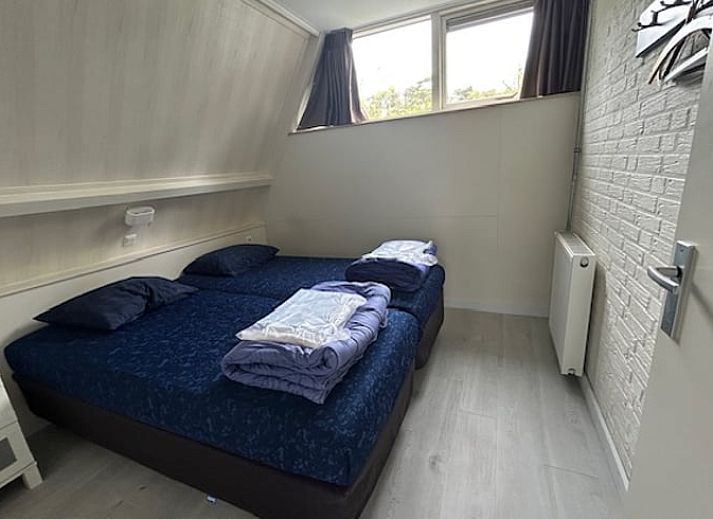 Modern kitchen and dining area in Holiday home in Stramproy, an attractive vacation home in Central Limburg, ideal for a relaxing stay.