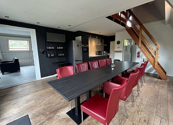 Modern kitchen and dining area in Holiday home in Stramproy, an attractive vacation home in Central Limburg, ideal for a relaxing stay.