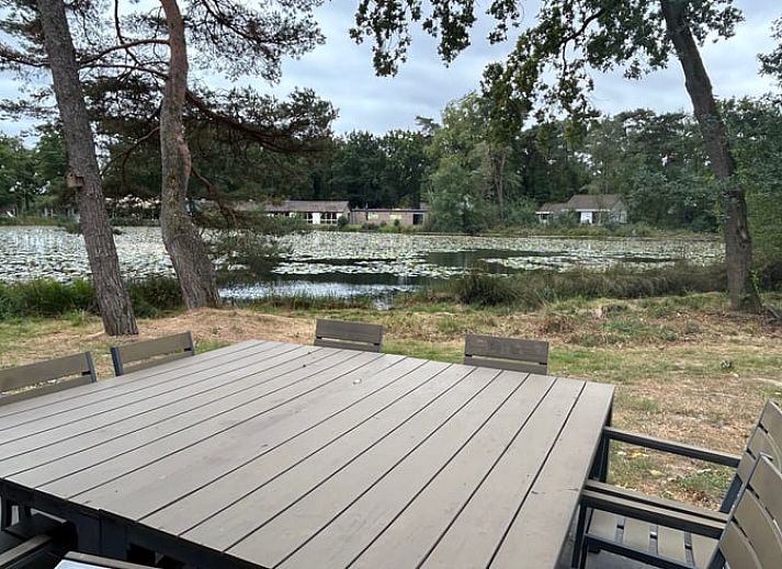 Stylish living room of Holiday Home in Stramproy, Central Limburg, with modern furnishings and comfortable seating area for relaxation.