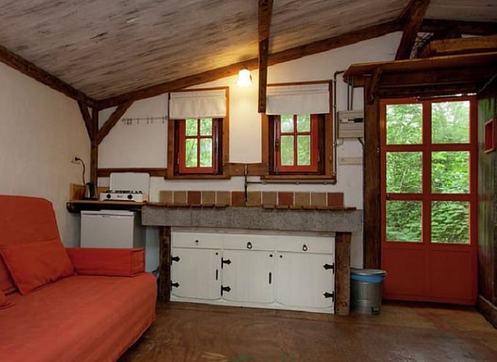 Huisje in Leudal, een charmant vakantiehuis in Midden Limburg, omringd door weelderige natuur en rustieke bossen.