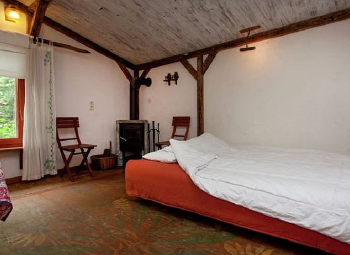 Huisje in Leudal, een charmant vakantiehuis in Midden Limburg, omringd door weelderige natuur en rustieke bossen.