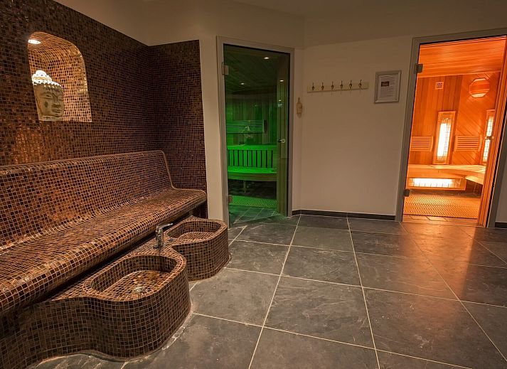 See-through from kitchen to living room in Detached house in Susteren, Central Limburg, with lots of natural light.