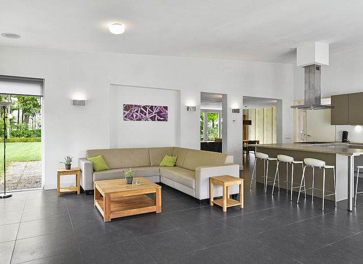 Landgoed Aerwinkel 10-person bungalow in Posterholt with green garden and veranda in Limburg.