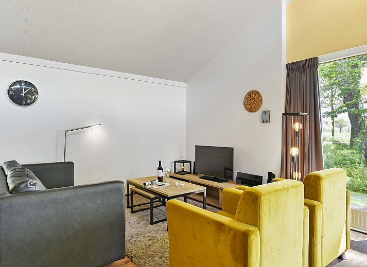 Landgoed Aerwinkel 4-persoons bungalow 4BL in Posterholt, Limburg, met moderne architectuur omringd door groene natuur.