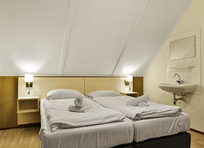 Comfortabele zithoek met uitzicht op natuur in Landgoed Aerwinkel, Posterholt.