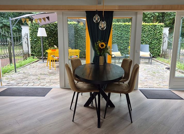 Modern kitchen in Holiday Home in Nederweert-Eind, Central Limburg overlooking sunny terrace and garden, ideal for a relaxing stay.