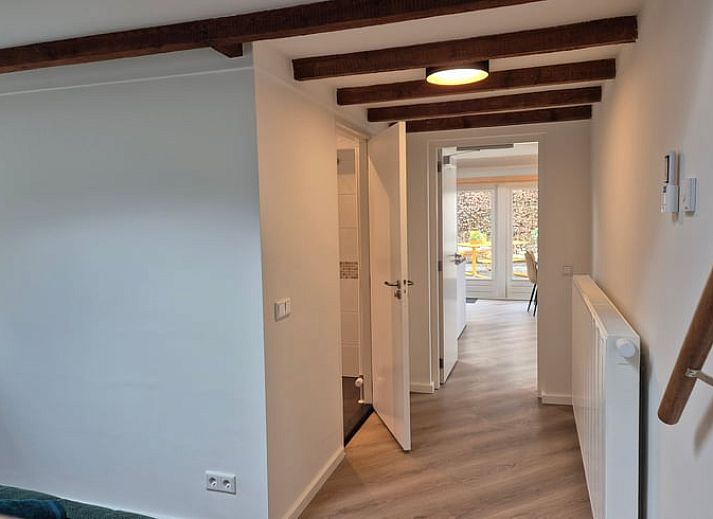 Modern kitchen in Holiday Home in Nederweert-Eind, Central Limburg overlooking sunny terrace and garden, ideal for a relaxing stay.