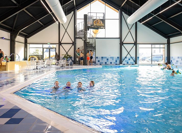 Gezellige tuin en veranda van de Vrijstaande woning in Thorn, ideaal voor familiebijeenkomsten in Midden Limburg.