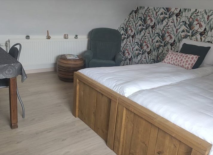 Geniessen Sie den gruenen Garten von Huisje in Kelpen-Oler, einem Ferienhaus in Mittellimburg, mit schoener Aussicht auf die Natur.