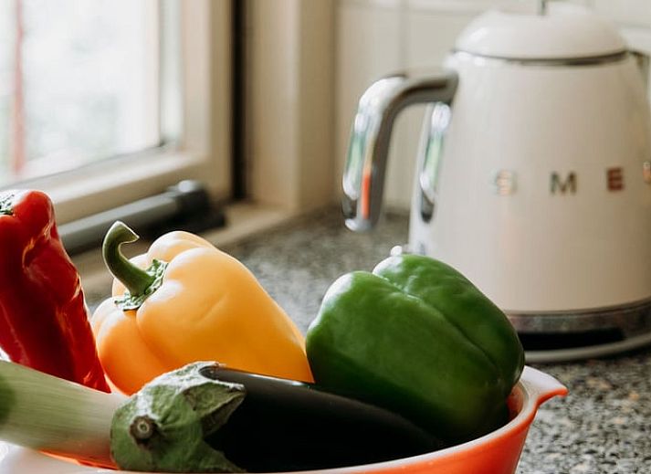 Modern sitting area in Holiday Home in Haelen, Central Limburg, overlooking nature.