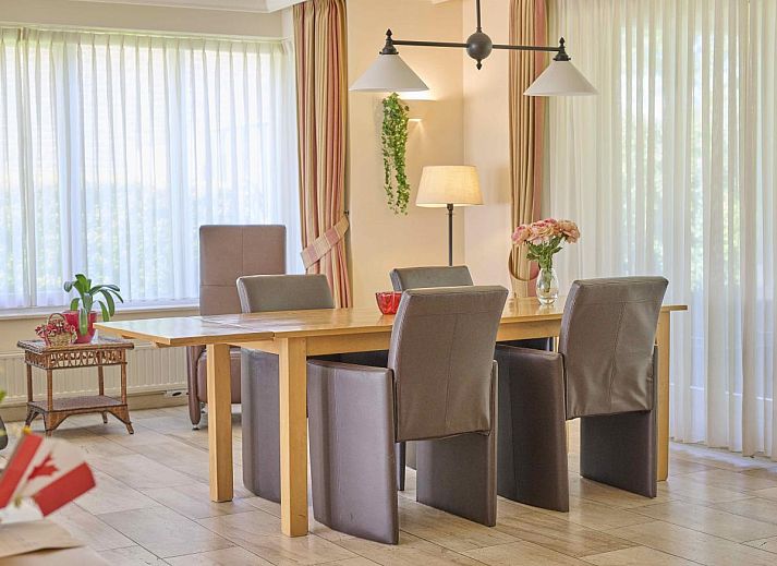 Bright sitting area in Lionshuis vacation home in Panningen, Limburg with modern appliances.